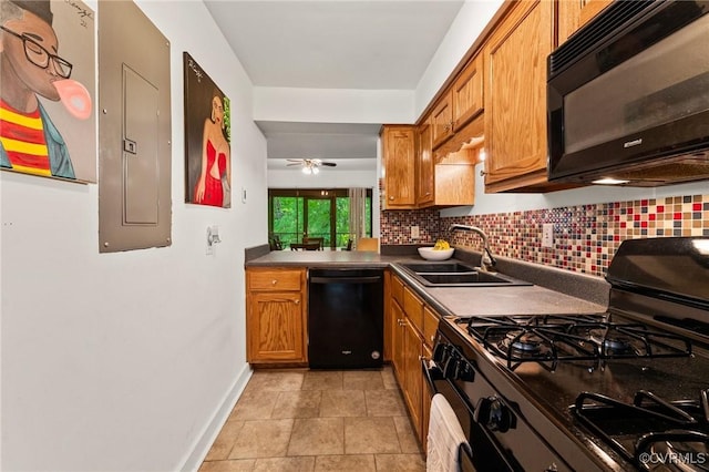 kitchen with a sink, electric panel, brown cabinets, and black appliances