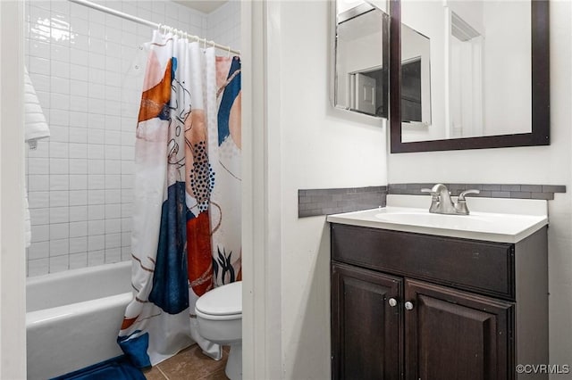 bathroom with vanity, shower / tub combo with curtain, tile patterned flooring, toilet, and tasteful backsplash