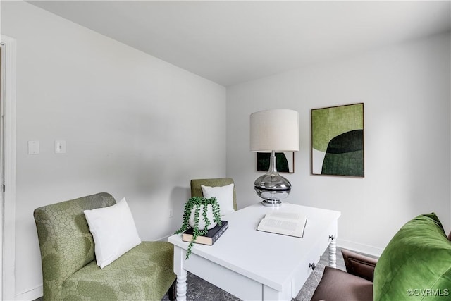 office space with baseboards