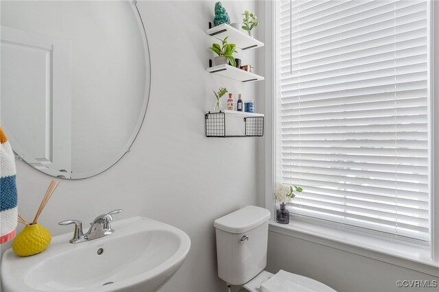 bathroom with a sink and toilet