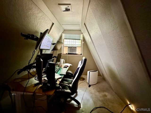 office area with lofted ceiling and cooling unit
