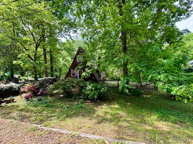 view of yard with fence