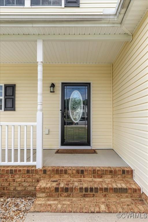 property entrance with a porch