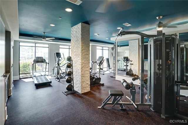 exercise room with ceiling fan, visible vents, baseboards, ornate columns, and recessed lighting