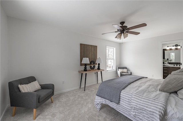 bedroom with baseboards, multiple windows, a ceiling fan, and light colored carpet