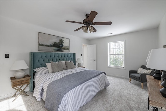 bedroom with carpet floors, a ceiling fan, baseboards, and visible vents