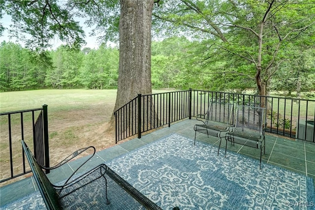deck featuring a lawn