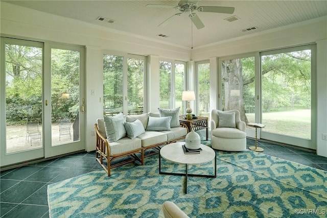 sunroom / solarium with visible vents and tile patterned flooring