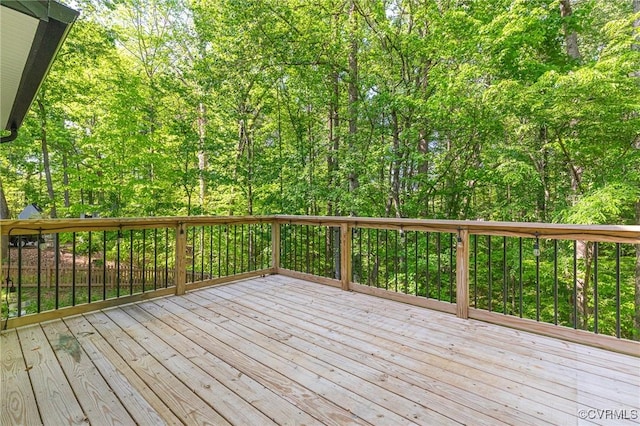deck with a wooded view