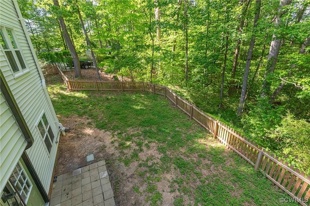 view of yard with a fenced backyard