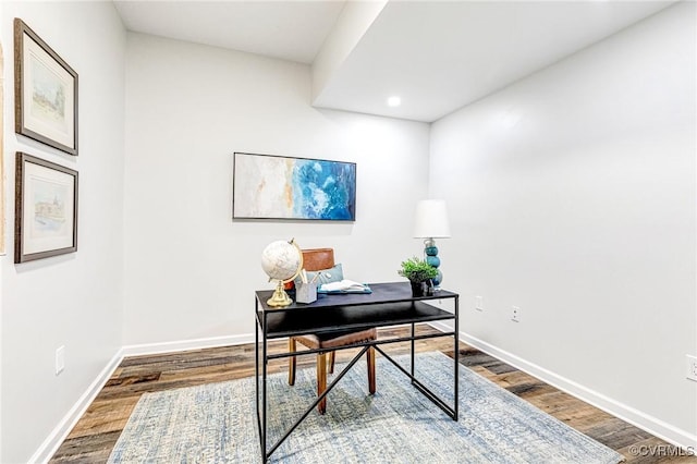 home office with recessed lighting, baseboards, and wood finished floors