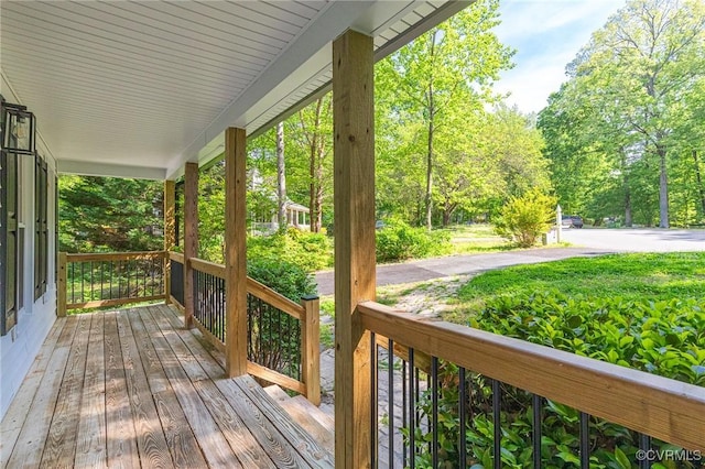wooden deck featuring a porch