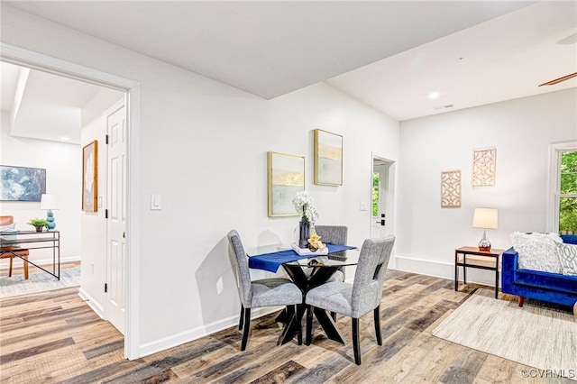 dining area featuring light wood-style floors, recessed lighting, baseboards, and visible vents