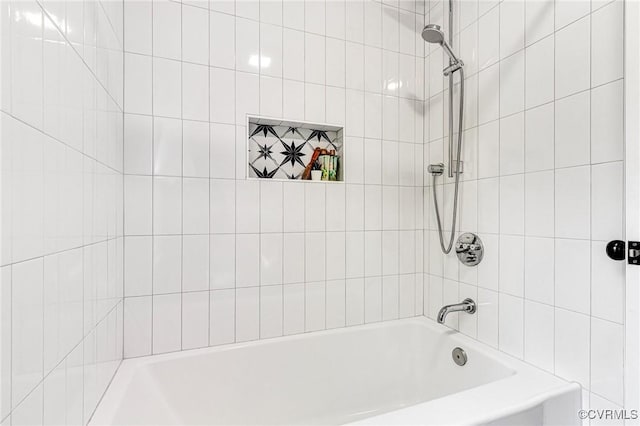 bathroom featuring  shower combination