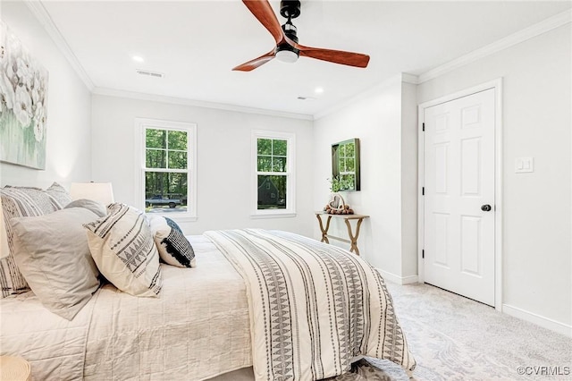 bedroom with crown molding, light carpet, a ceiling fan, baseboards, and recessed lighting