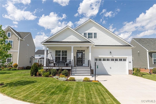 craftsman-style home featuring a garage, concrete driveway, a porch, and a front lawn