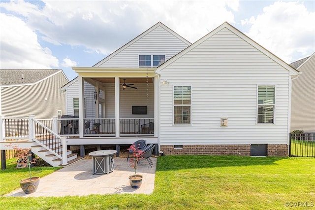 back of house featuring a lawn, crawl space, a ceiling fan, and a patio area