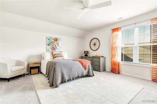 bedroom featuring carpet flooring, baseboards, visible vents, and vaulted ceiling