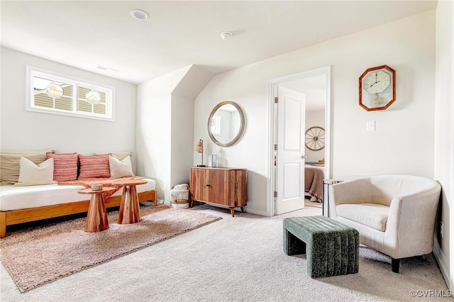 living room with baseboards and carpet