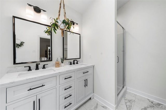 bathroom with a sink, baseboards, a shower stall, and marble finish floor