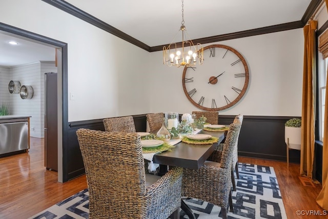 2951 W Maple Grove Ln, Powhatan, VA 23139 - dining room with a chandelier, crown molding, wood finished floors, and a wainscoted wall