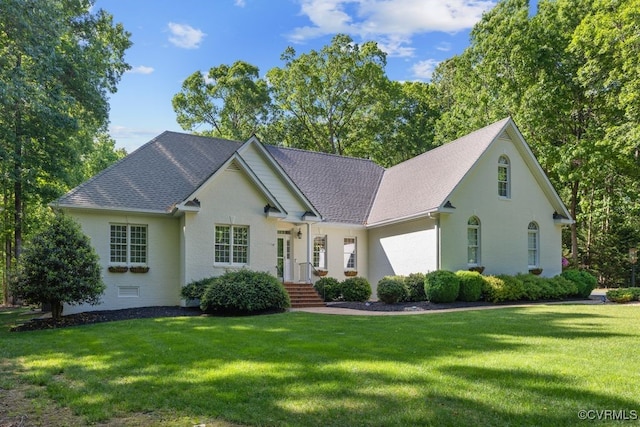 2951 W Maple Grove Ln, Powhatan, VA 23139 - ranch-style house with a front yard and roof with shingles