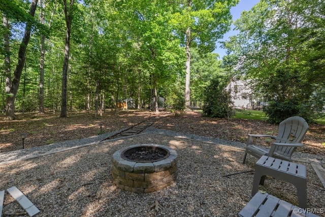 2951 W Maple Grove Ln, Powhatan, VA 23139 - view of yard featuring a fire pit