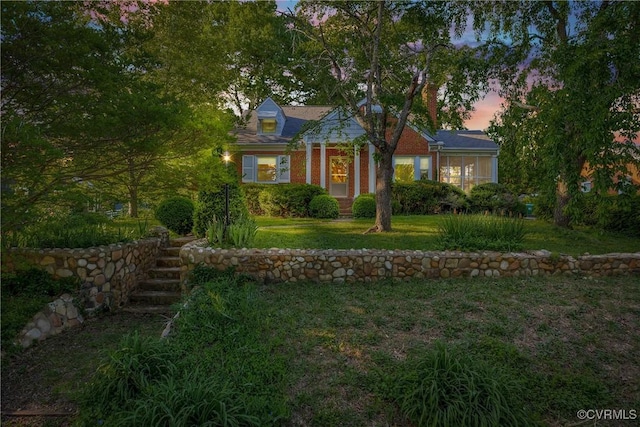 102 Norman Dr, Henrico, VA 23227 - view of front of property featuring a lawn and brick siding