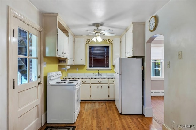 102 Norman Dr, Henrico, VA 23227 - kitchen featuring a ceiling fan, white appliances, light wood-style floors, a baseboard heating unit, and arched walkways
