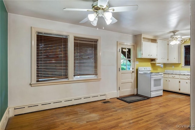 102 Norman Dr, Henrico, VA 23227 - kitchen featuring a ceiling fan, white range with electric cooktop, white cabinets, a baseboard heating unit, and light wood-style floors