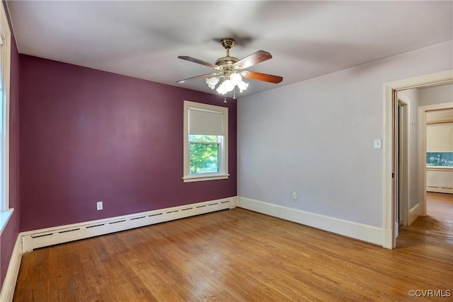 102 Norman Dr, Henrico, VA 23227 - spare room featuring baseboards, ceiling fan, wood finished floors, and a baseboard radiator
