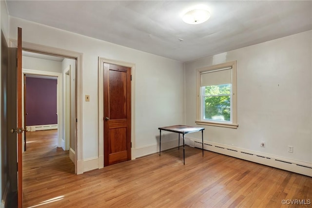 102 Norman Dr, Henrico, VA 23227 - interior space with baseboards, a baseboard radiator, and light wood finished floors