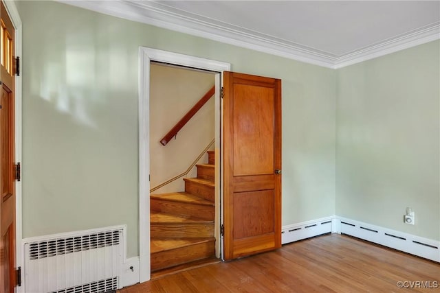 102 Norman Dr, Henrico, VA 23227 - interior space featuring wood finished floors, ornamental molding, and radiator heating unit