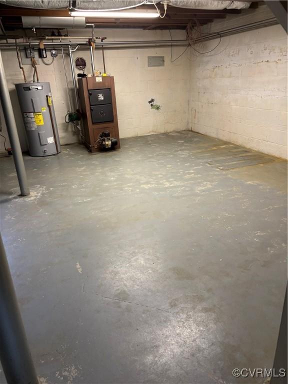 102 Norman Dr, Henrico, VA 23227 - unfinished below grade area with water heater and concrete block wall