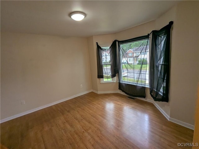 3900 Elmswell Dr, Richmond, VA 23223 - spare room featuring wood finished floors and baseboards