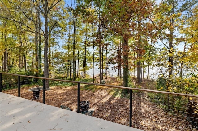 exterior space with a water view and central AC unit