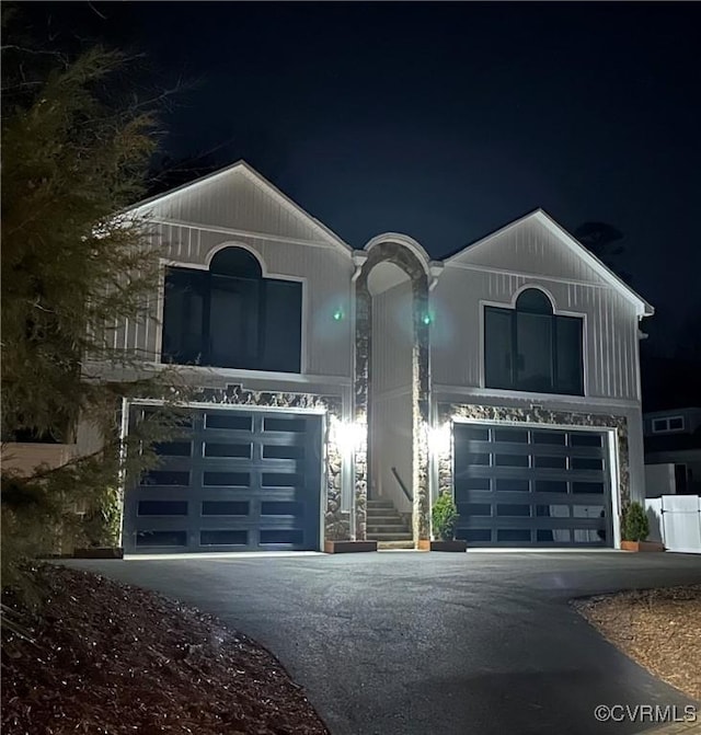 view of front of home featuring a garage and driveway