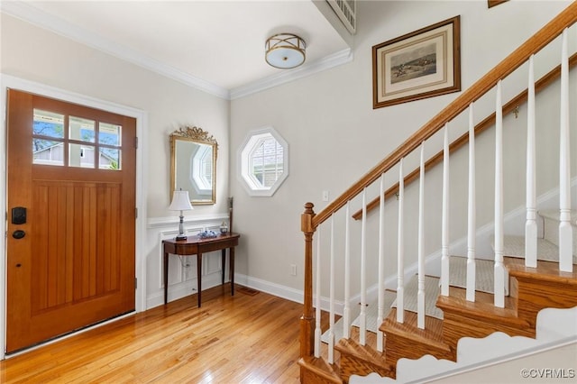 4708 Hanover Ave, Richmond, VA 23226 - entryway featuring crown molding, a healthy amount of sunlight, stairway, and light wood-type flooring