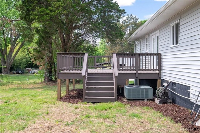 view of yard with stairway, a deck, and cooling unit