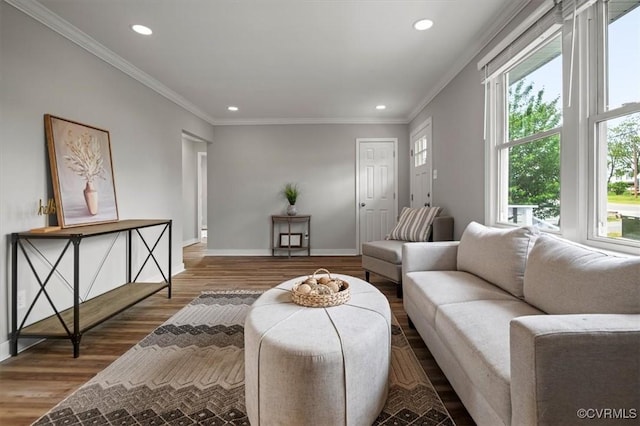 living area with recessed lighting, ornamental molding, baseboards, and wood finished floors