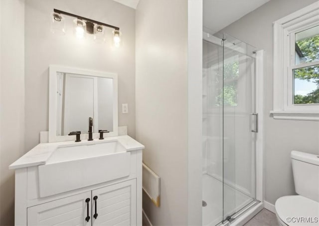 112 Webster Rd, Sandston, VA 23150 - bathroom featuring toilet, a shower stall, vanity, and baseboards