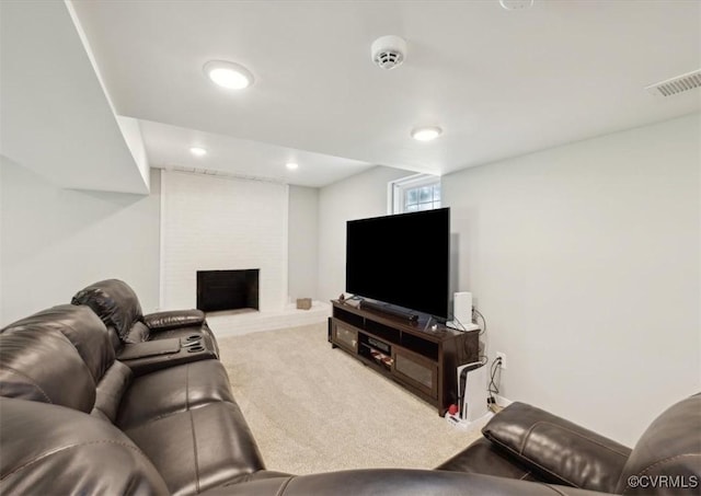 112 Webster Rd, Sandston, VA 23150 - living area featuring carpet flooring, a brick fireplace, and recessed lighting