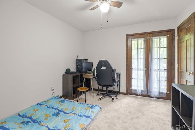 bedroom with baseboards, light colored carpet, and ceiling fan
