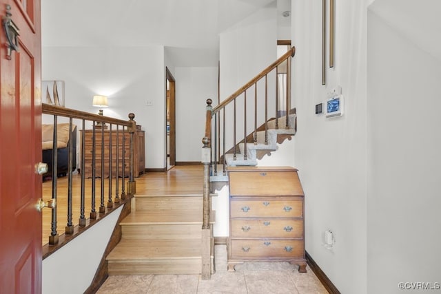 staircase with baseboards