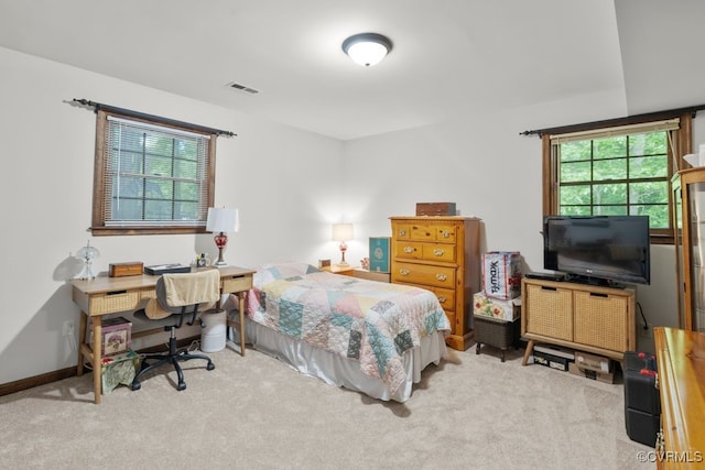 bedroom featuring carpet and visible vents