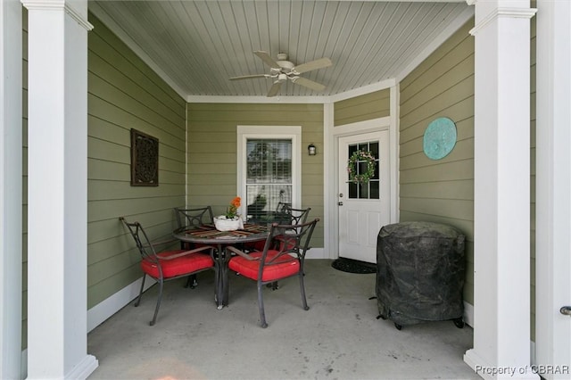 view of patio with ceiling fan and outdoor dining space
