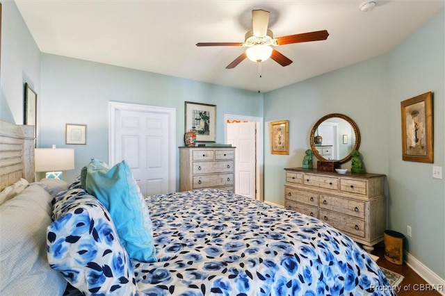 bedroom with baseboards and a ceiling fan