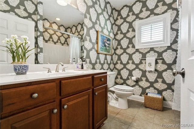 full bathroom featuring a shower with curtain, tile patterned flooring, vanity, toilet, and wallpapered walls