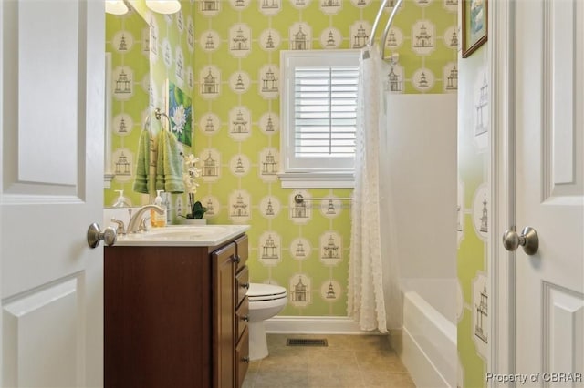full bath featuring vanity, tile patterned floors, visible vents, and toilet