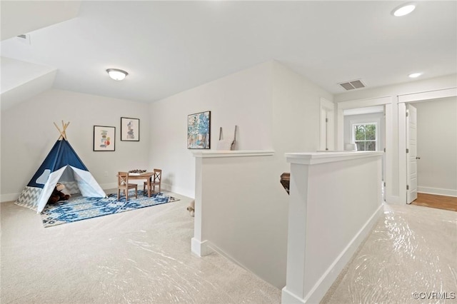 rec room featuring recessed lighting, baseboards, visible vents, and carpet